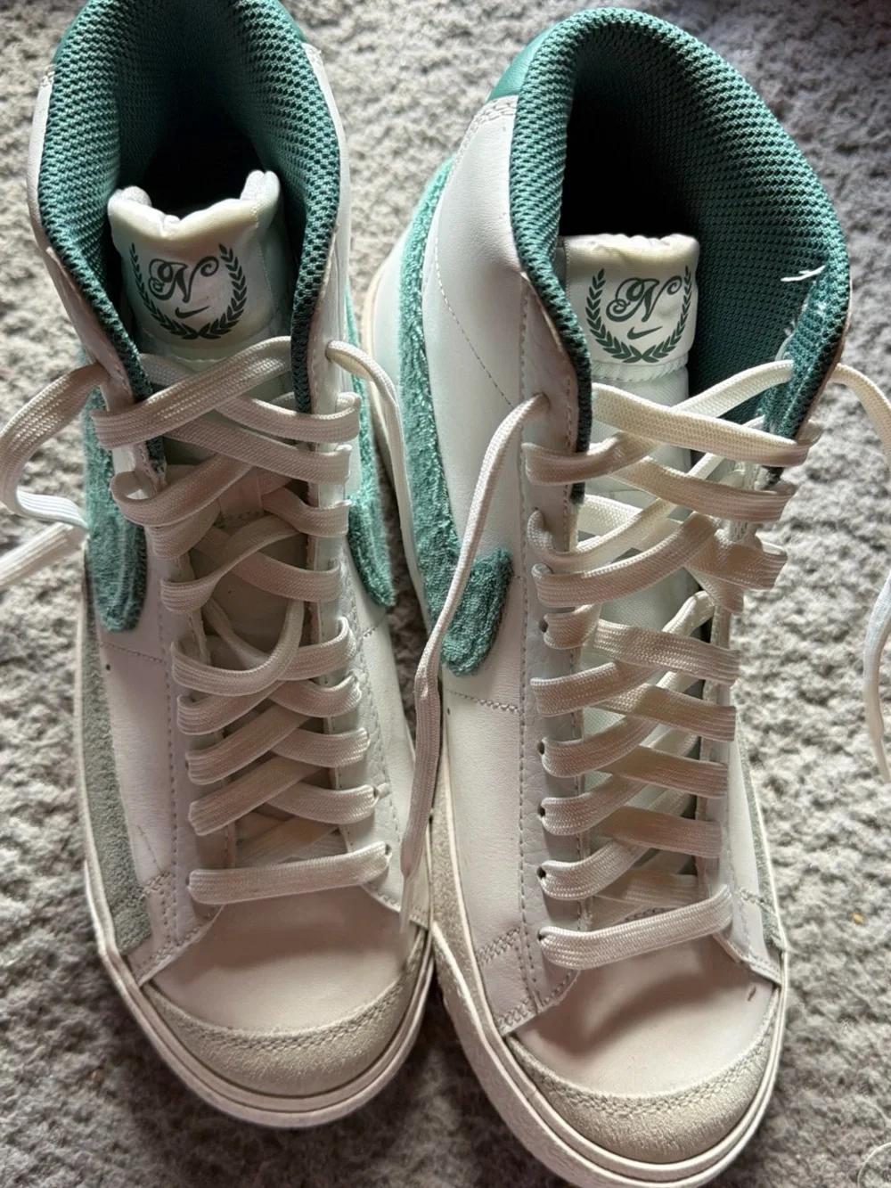 Nike White Low-Top Sneakers with Green Fuzzy Swoosh